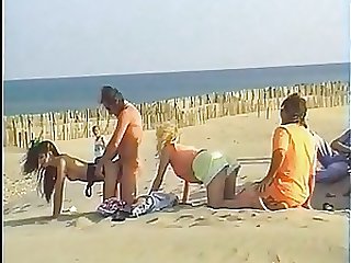 Babes Get Fucked and Facialized in Voyeur Orgy At the Beach - Retro Porn